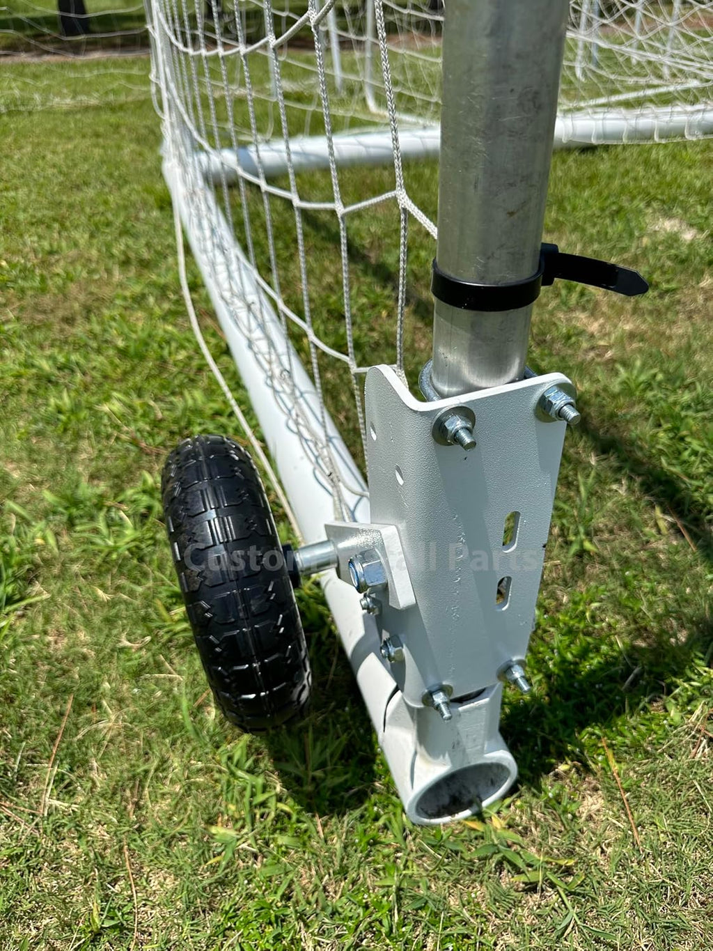 Soccer goal wheel kit installed on an Alumagoal goal