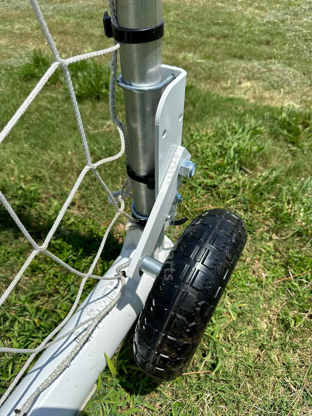 Soccer goal wheel kit installed on an Alumagoal goal