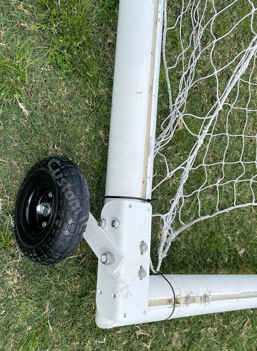 Soccer goal wheel kit installed on a Kwik Goal goal