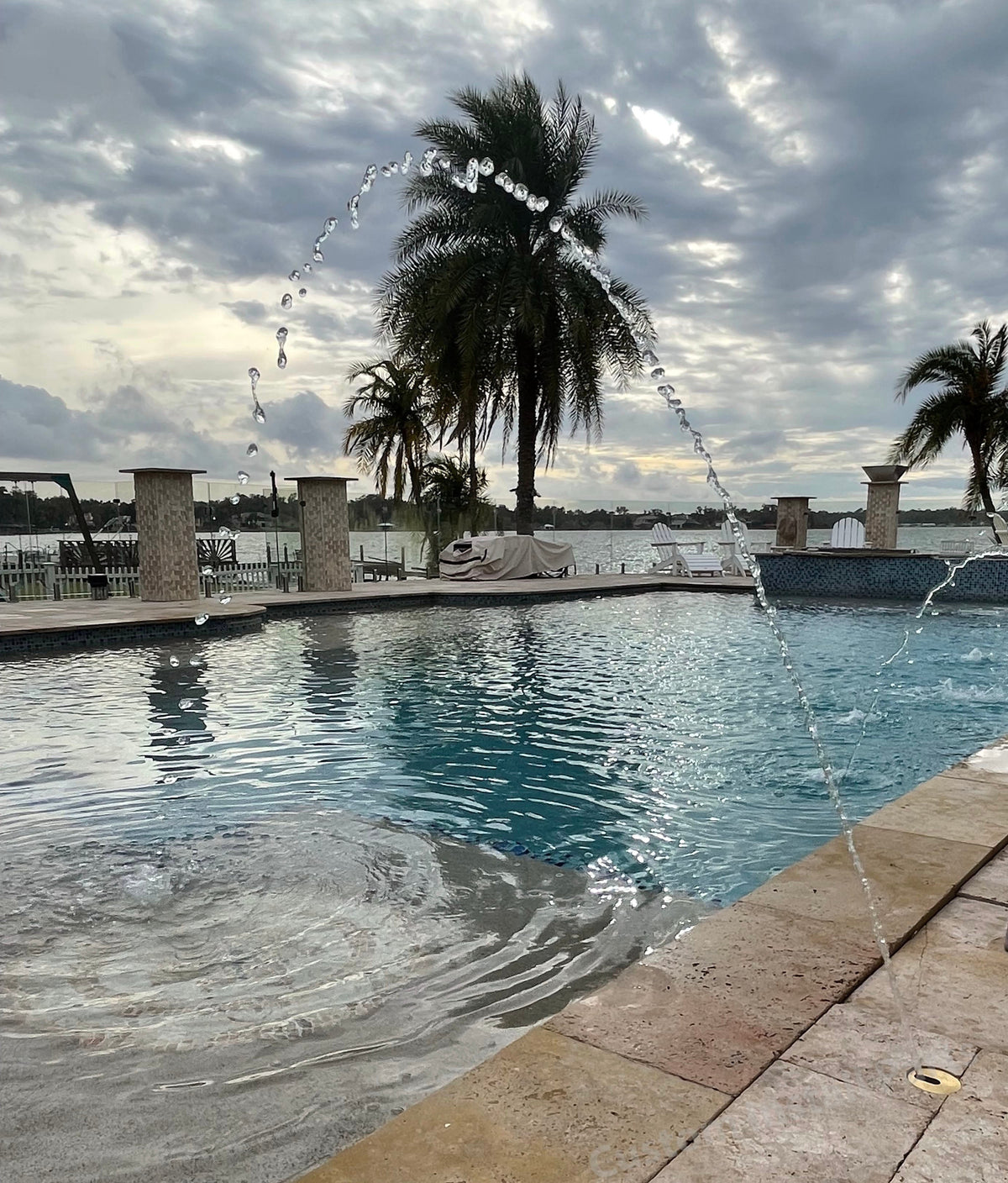 Pool deck jet fountain with solid brass cap